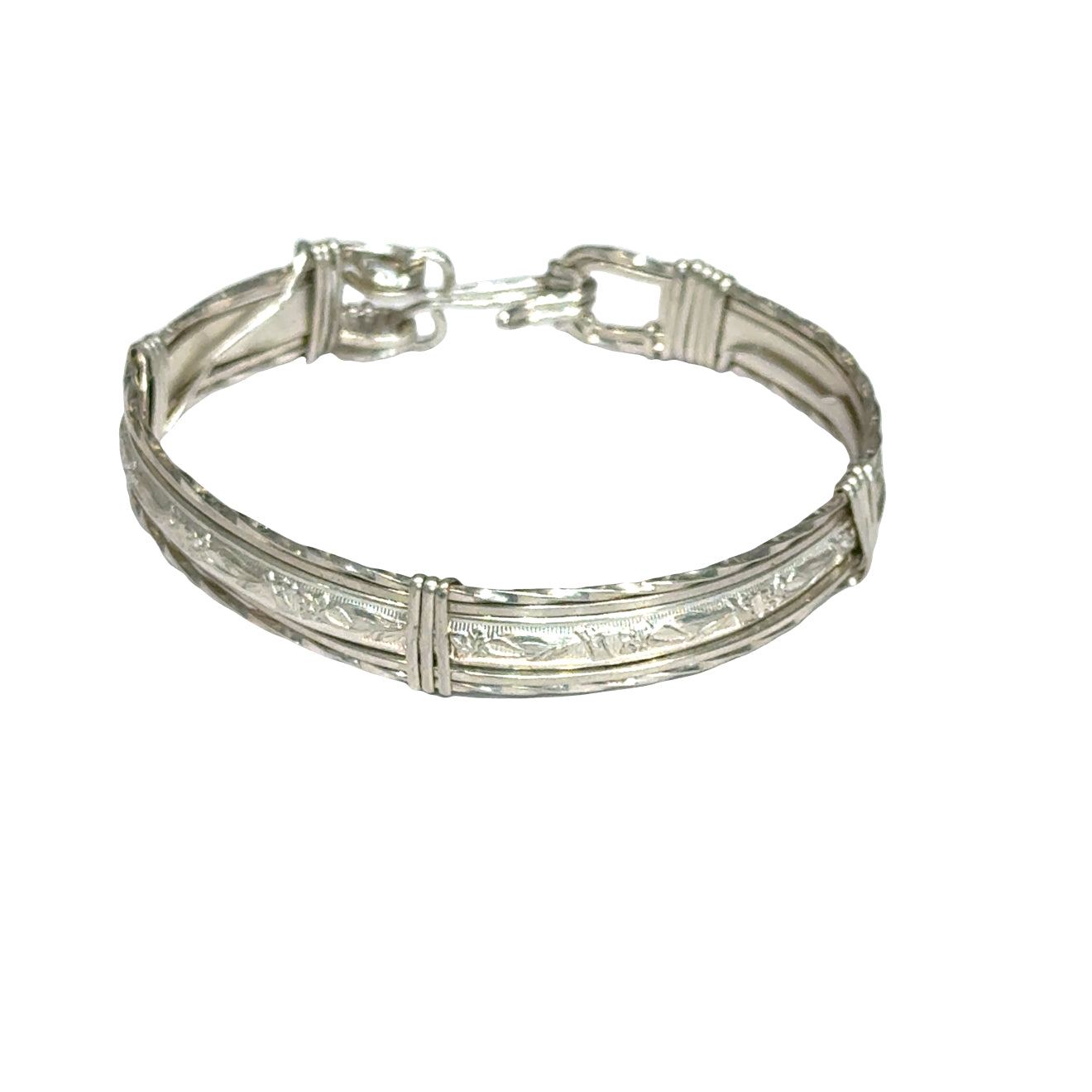Style #2 Sterling silver bangle with twisted and straight wire featuring line-designed centerpiece showing elegant classic design, on a white background, front close up view. 