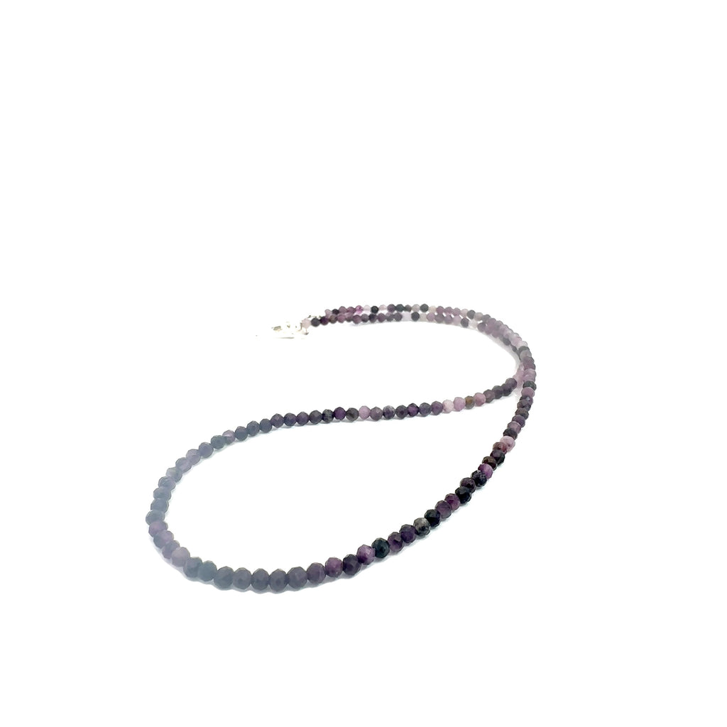 Sugilite Gemstone Necklace and bracelet  on white long angle overview
