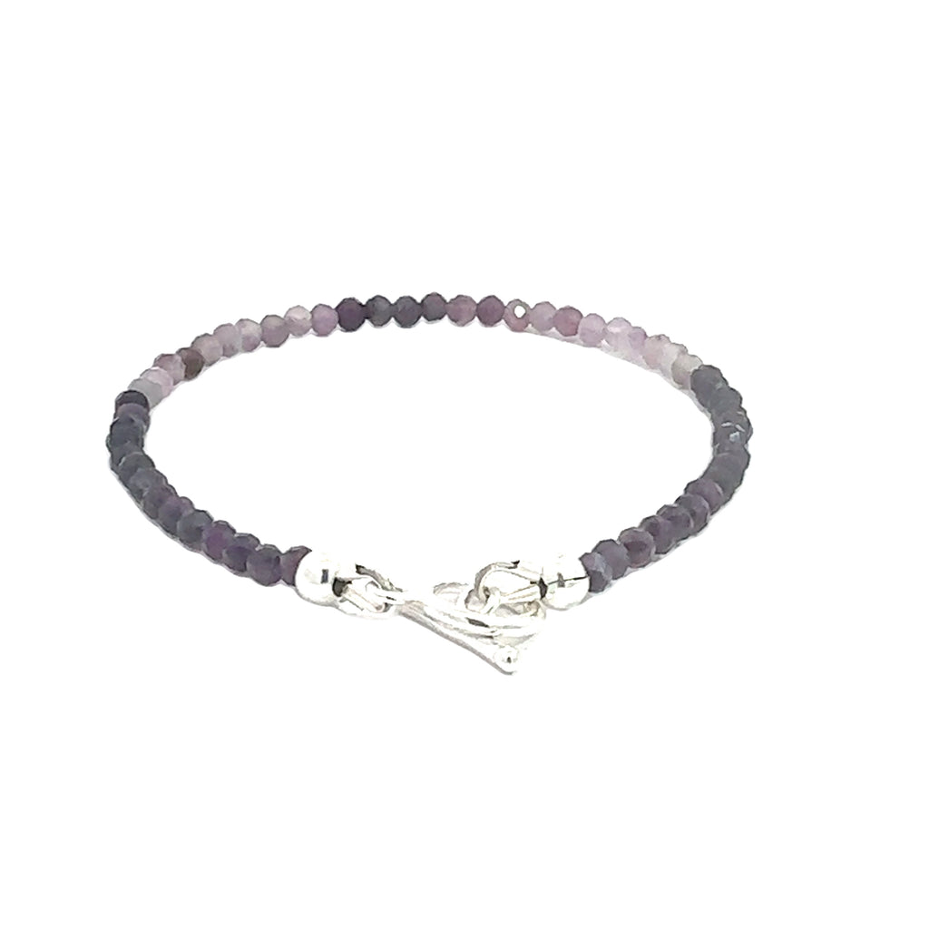 Sugilite Gemstone bracelet  on white back overview