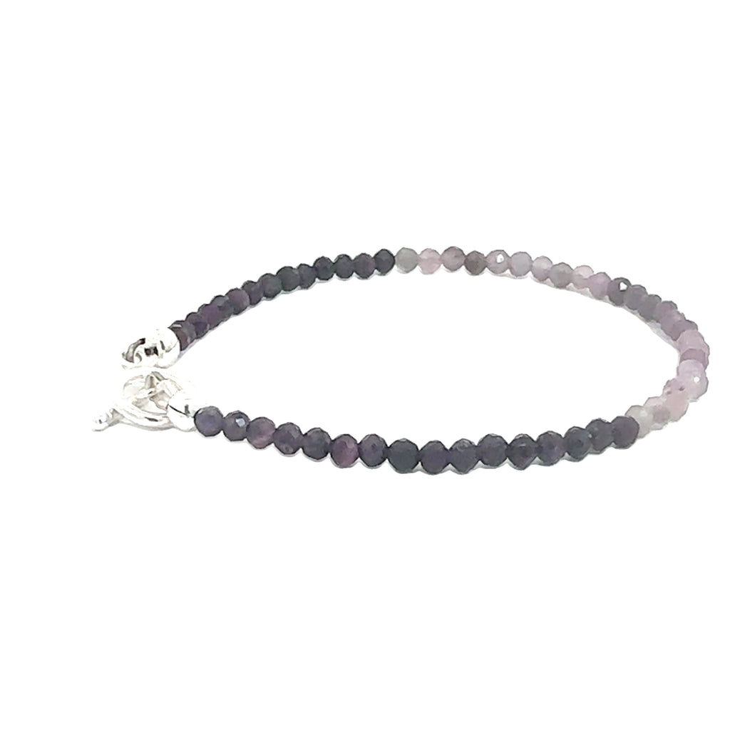 Sugilite Gemstone bracelet  on white left side overview
