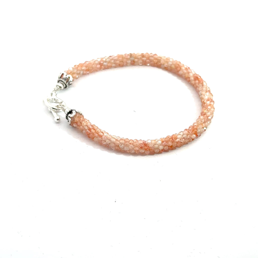 Sunstone Crocheted Gemstone Bracelet on white left side view 