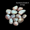 Sunstone Grade A stones on a black background with text indicating weight range (0-5g), front View.