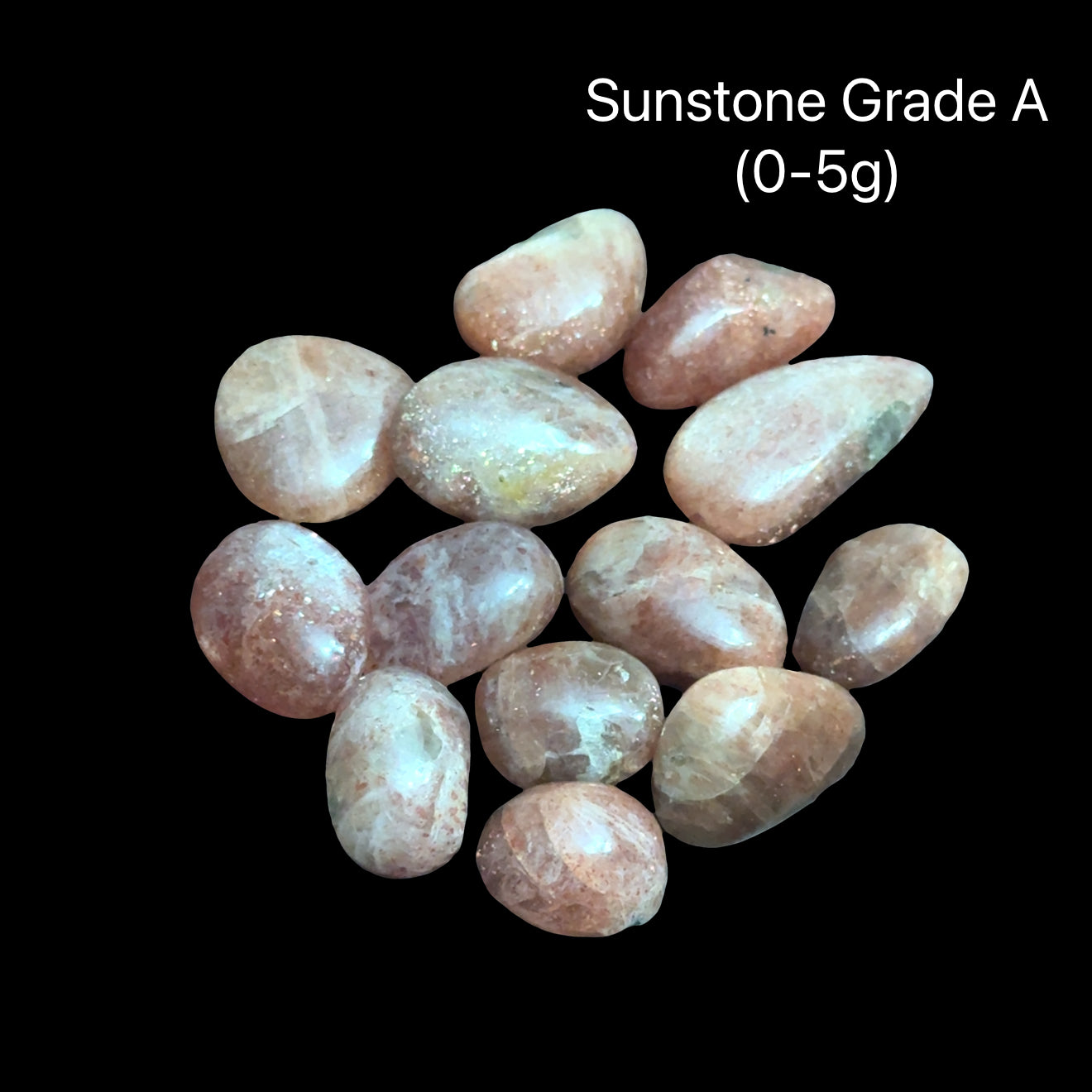 Sunstone Grade A stones on a black background with text indicating weight range (0-5g), front View.
