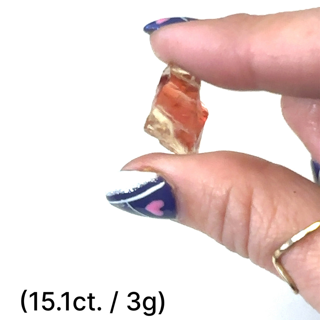 Sunstone Raw Gemstone from Oregon (3g) on white in hand view