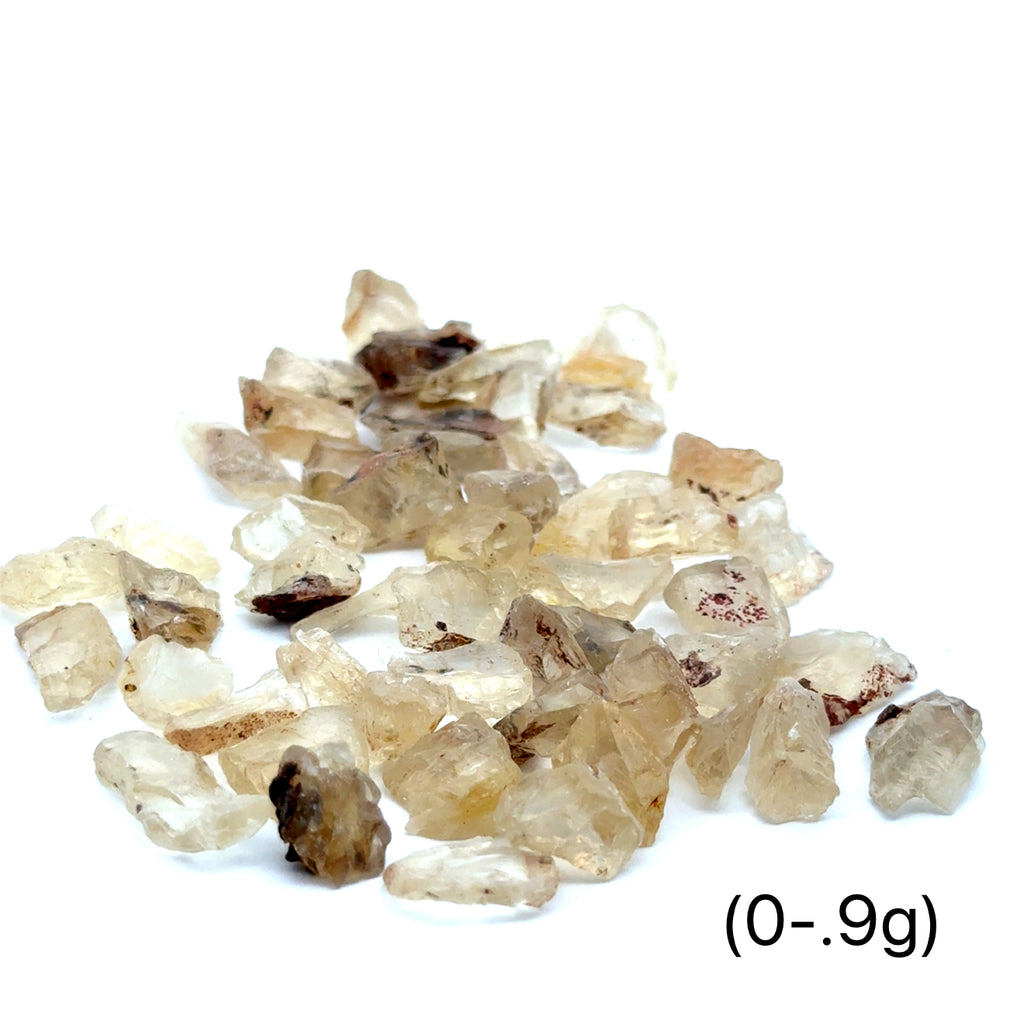 Sunstone Raw Gemstone from Oregon grouping (0-.9g)  on white front overview