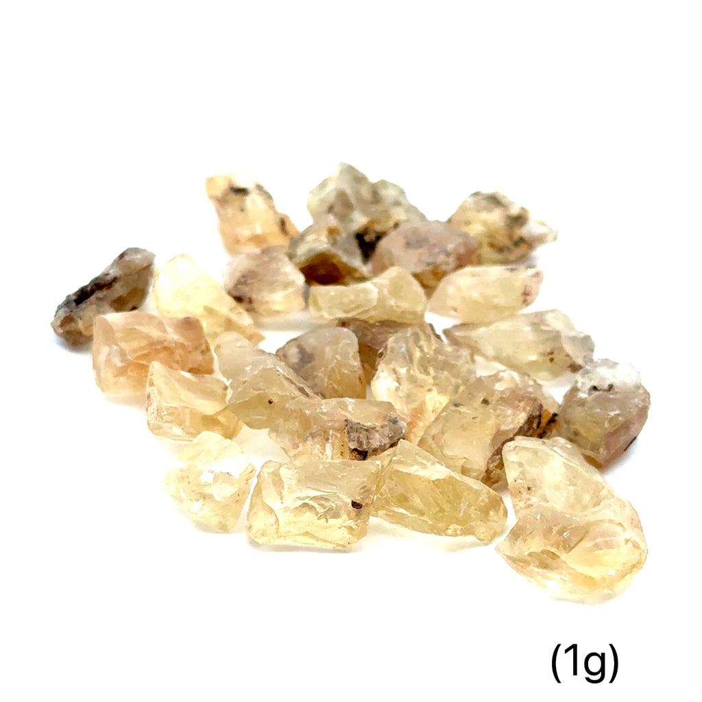 Sunstone Raw Gemstone from Oregon grouping (1g)  on white front overview