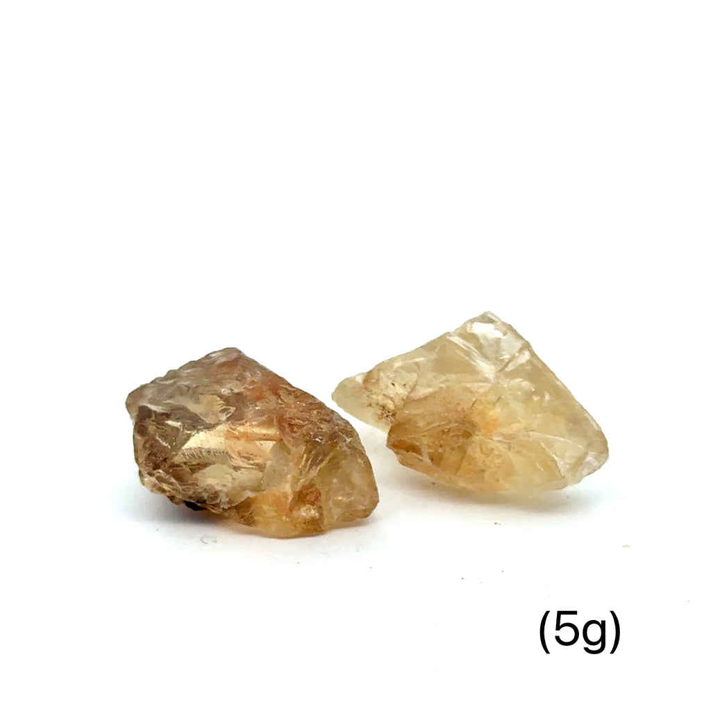 Sunstone Raw Gemstone from Oregon grouping (5g)  on white front overview