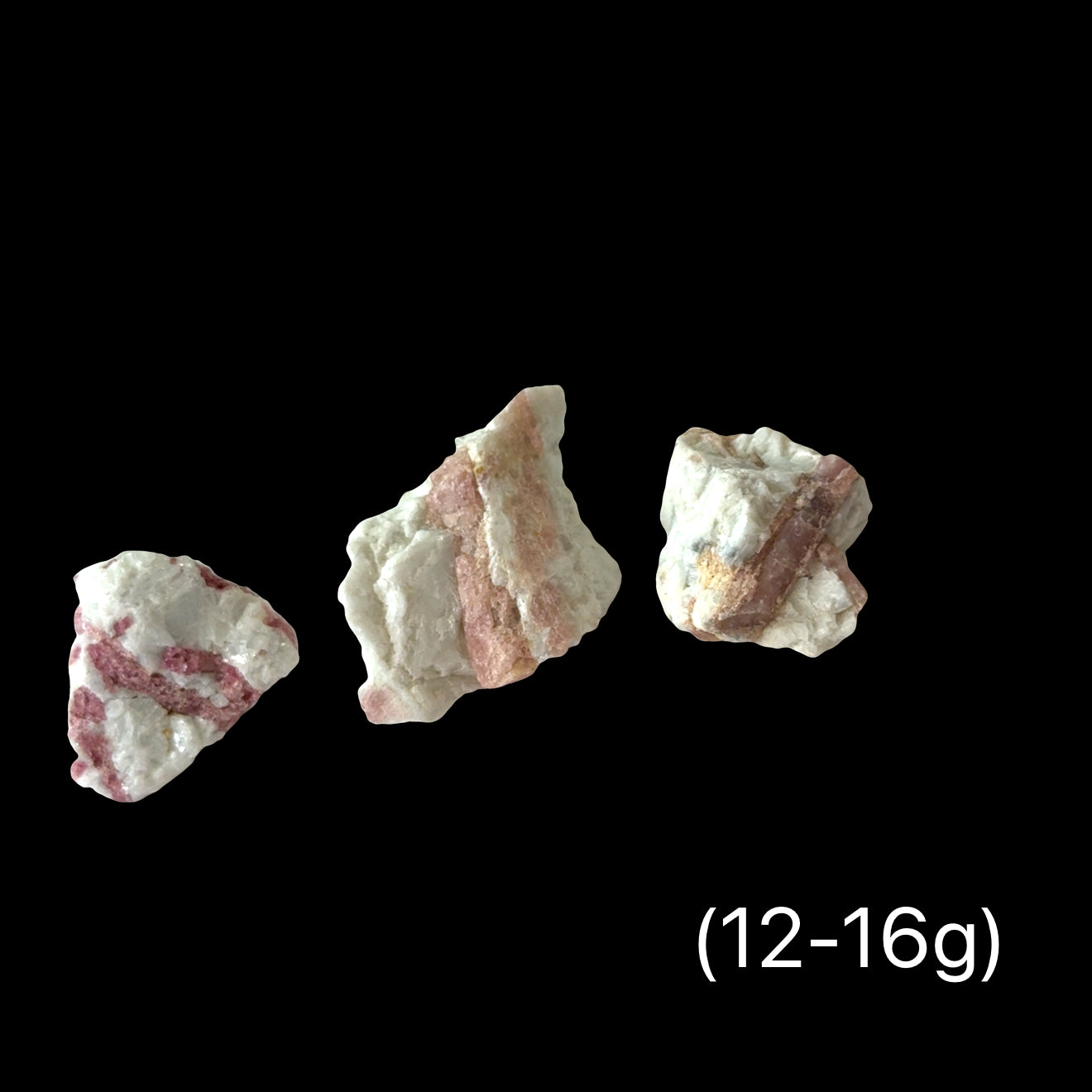 Three pieces of Rubellite Tourmaline in a Feldspar on a black background with weight indication (12-16g), front view.