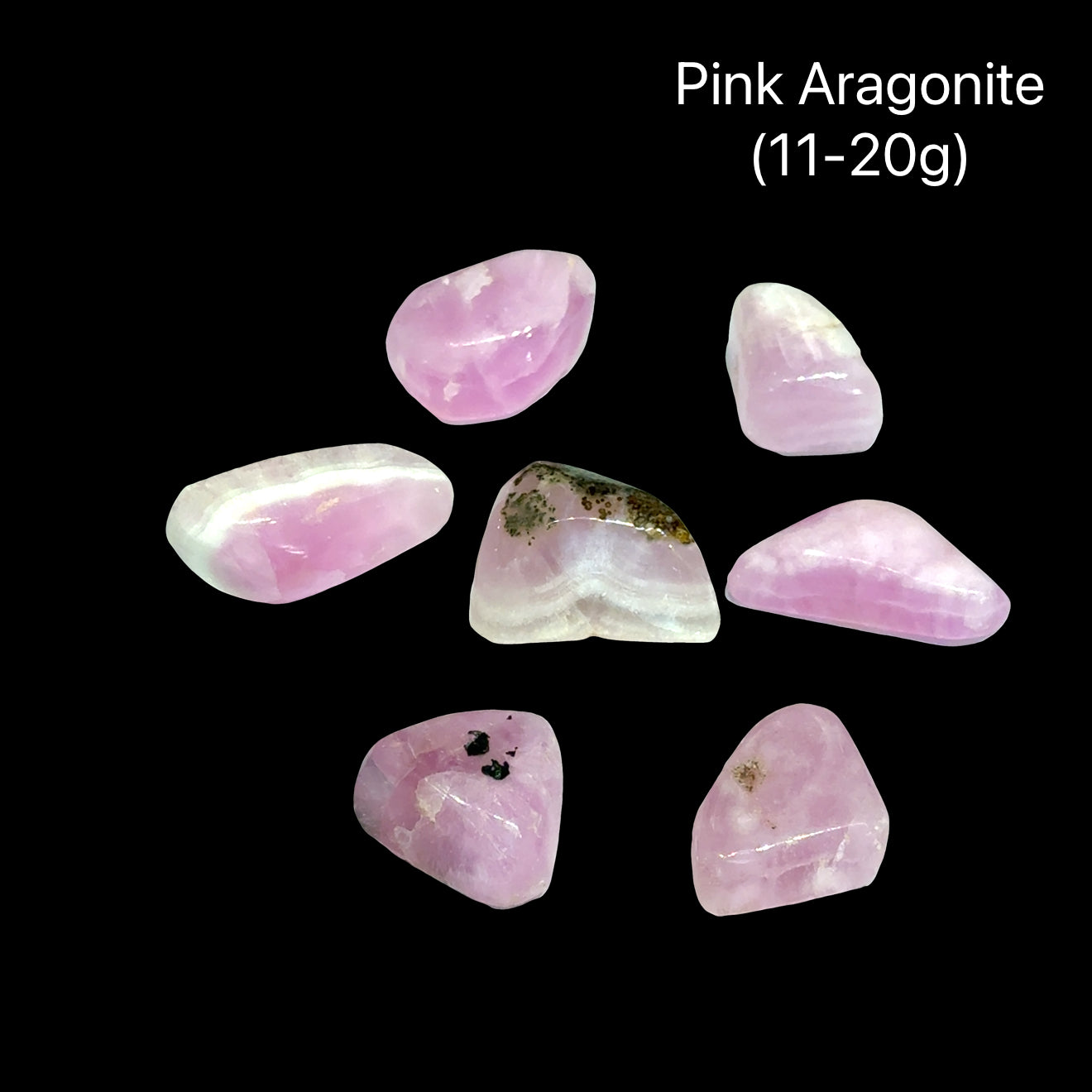 Three pink aragonite stones on a black background with text indicating weight range (11-20g), front view.
