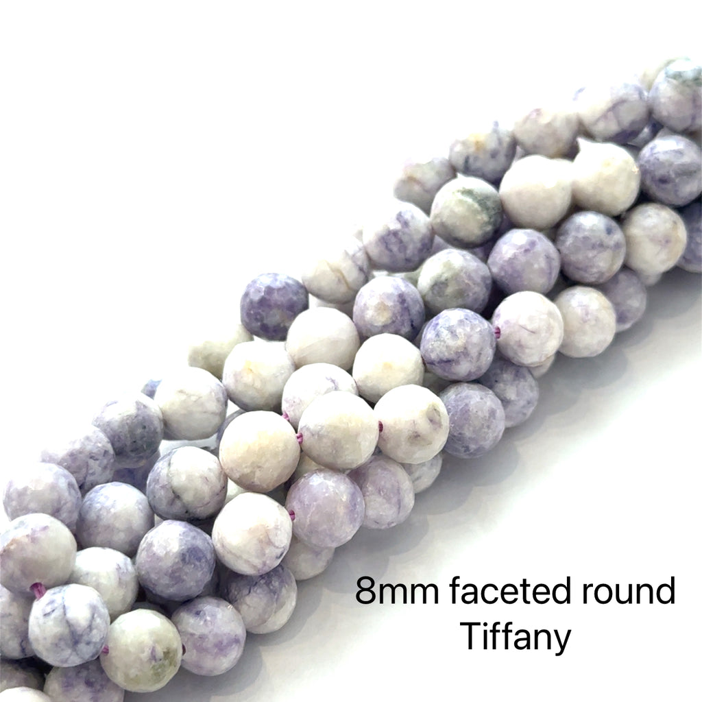 Tiffany Stone Gemstone Strand  8mm faceted round on white center overview