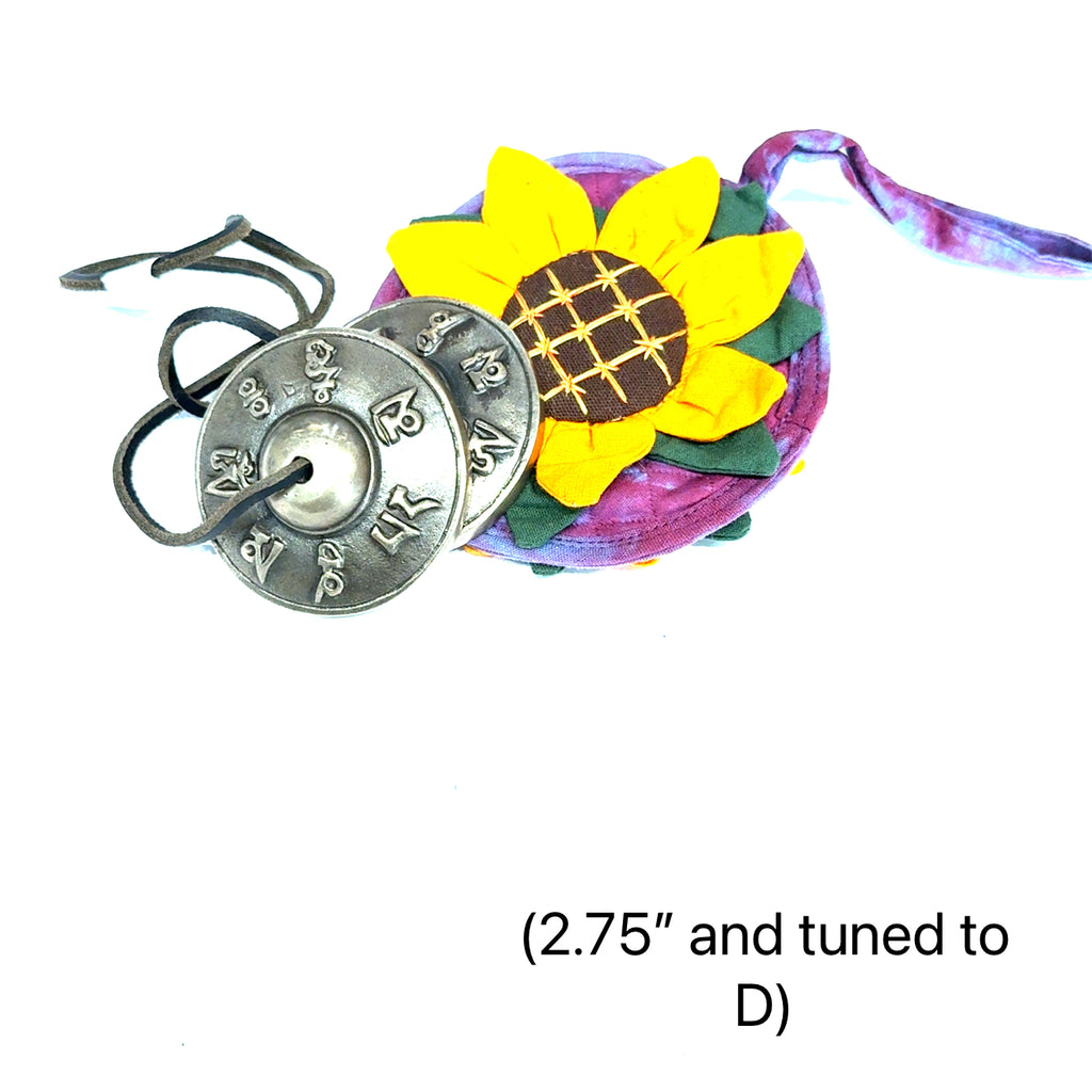 Tinsiga cymbals crafted by certified sound therapist for meditation and energy clearing (2.75'' and tuned to D)  on white overview