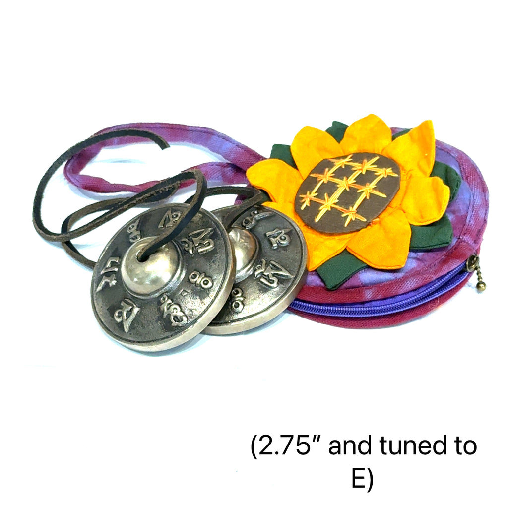 Tinsiga cymbals crafted by certified sound therapist for meditation and energy clearing (2.75'' and tuned to E)  on white overview