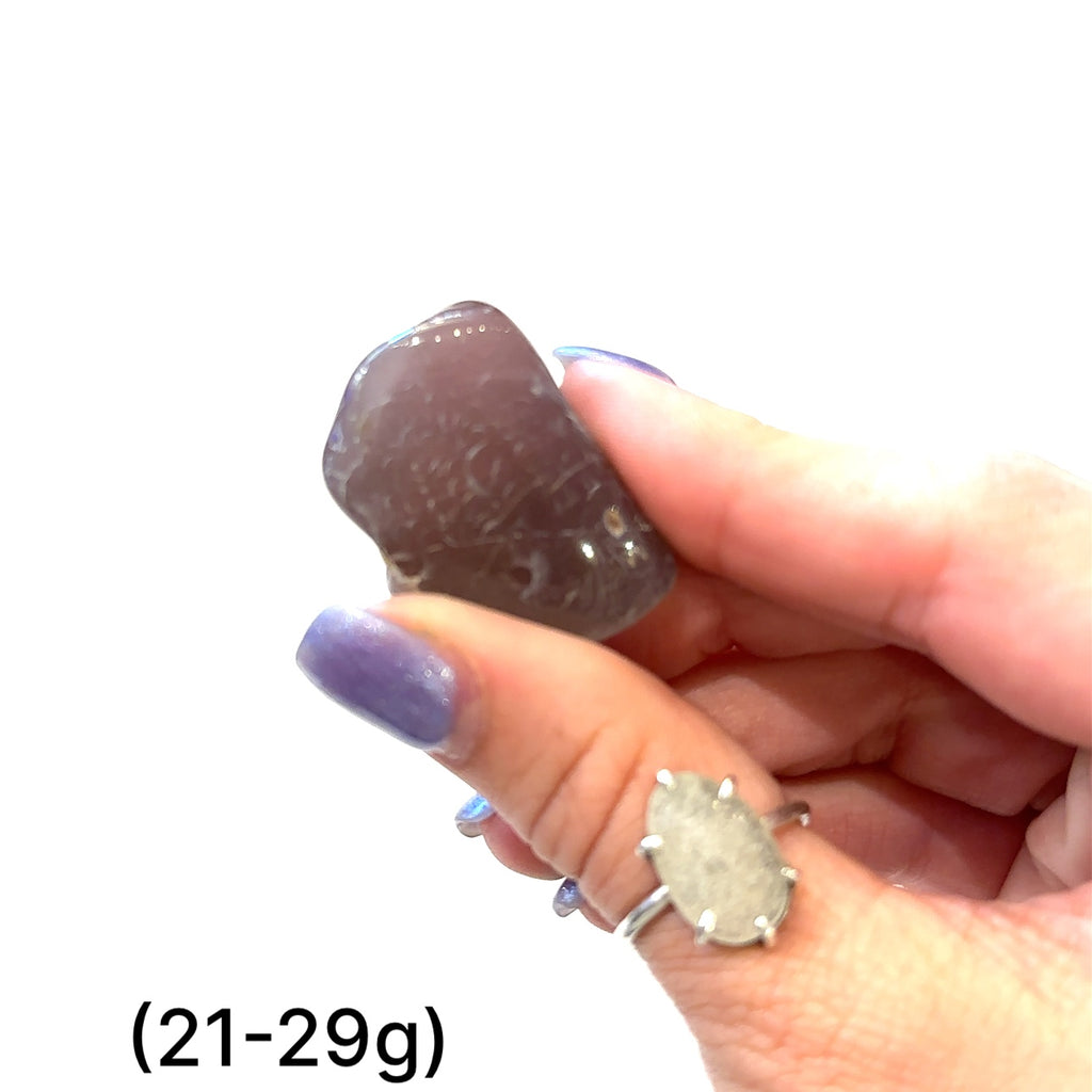 Tumbled Agate stone from Malawi, Africa for Root and Sacral chakra balance gemstone (21-29g) on white overview 