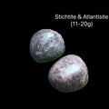 Two Atlantisite stones on a black background with text indicating weight range (11-20g), front view. 