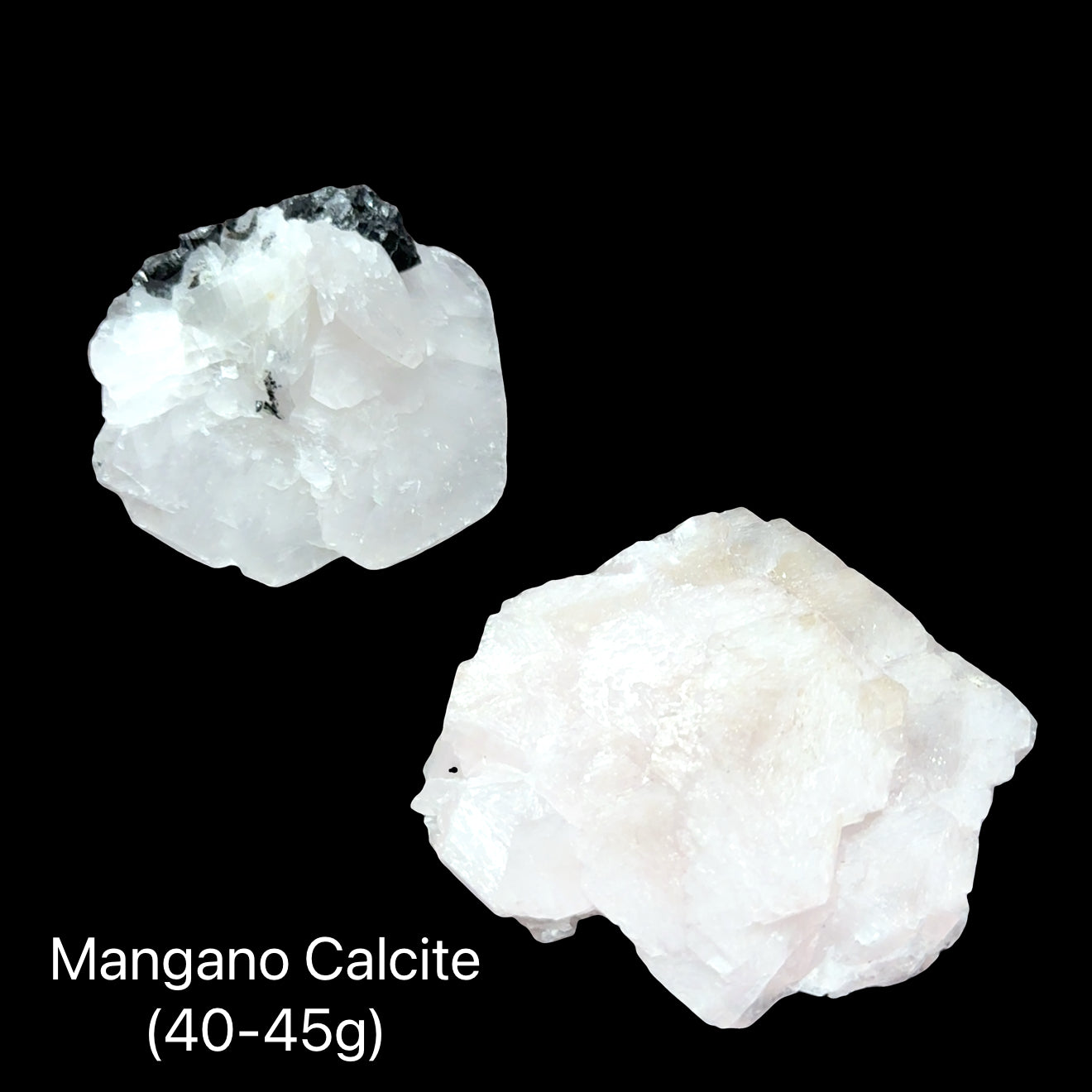 Two Raw mangano calcite from 2nd Sovetskii Mine Russia in soft blush pink for heart chakra healing anxiety relief and divine love with angel communication (40-45g), on a black background, front view. 