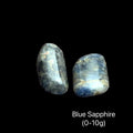 Two blue sapphires on a black background with text indicating weight range (0-10g), front view.