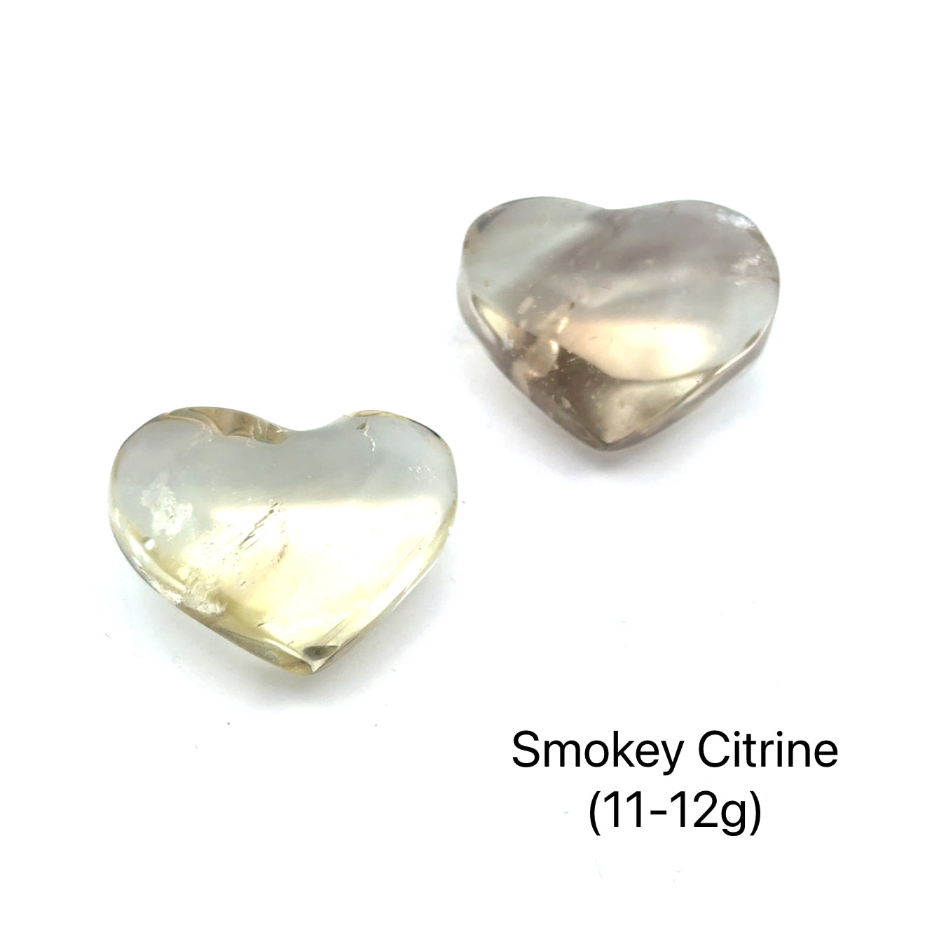 Two heart-shaped Smokey Citrine gemstones against a white background, size (11-12g), front overview.