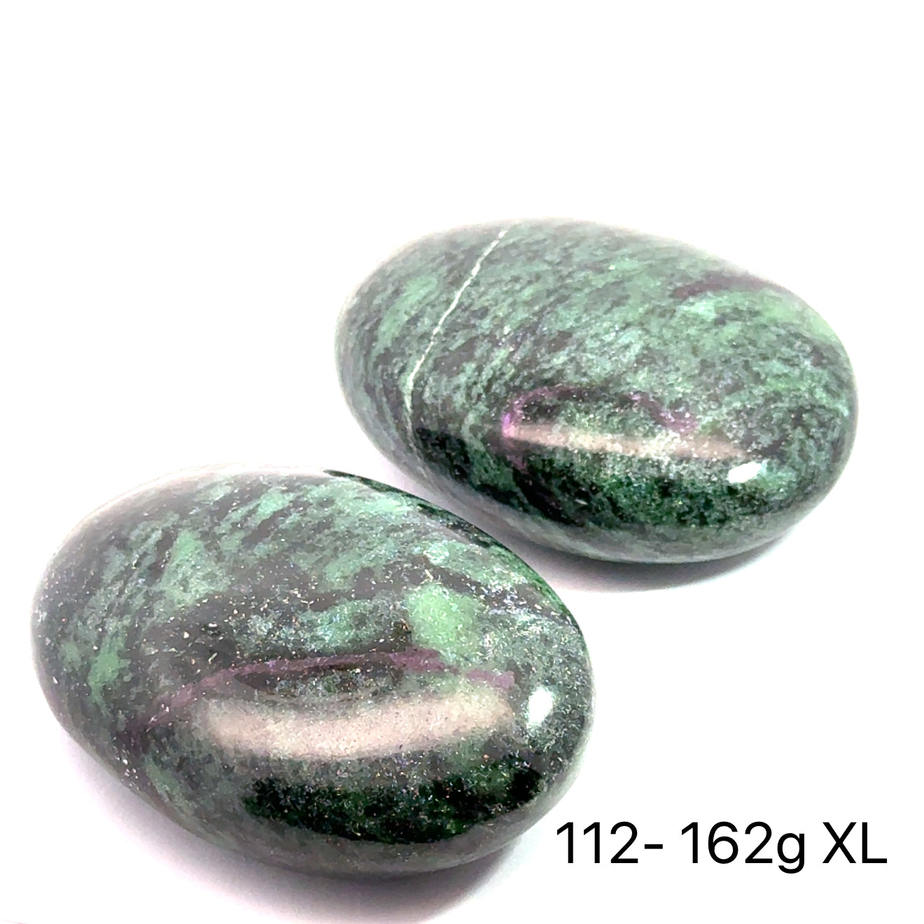 A collection of polished Ruby in Zoisite gemstone palm stones displayed on a white background in a line front overview size (12-162g XL)