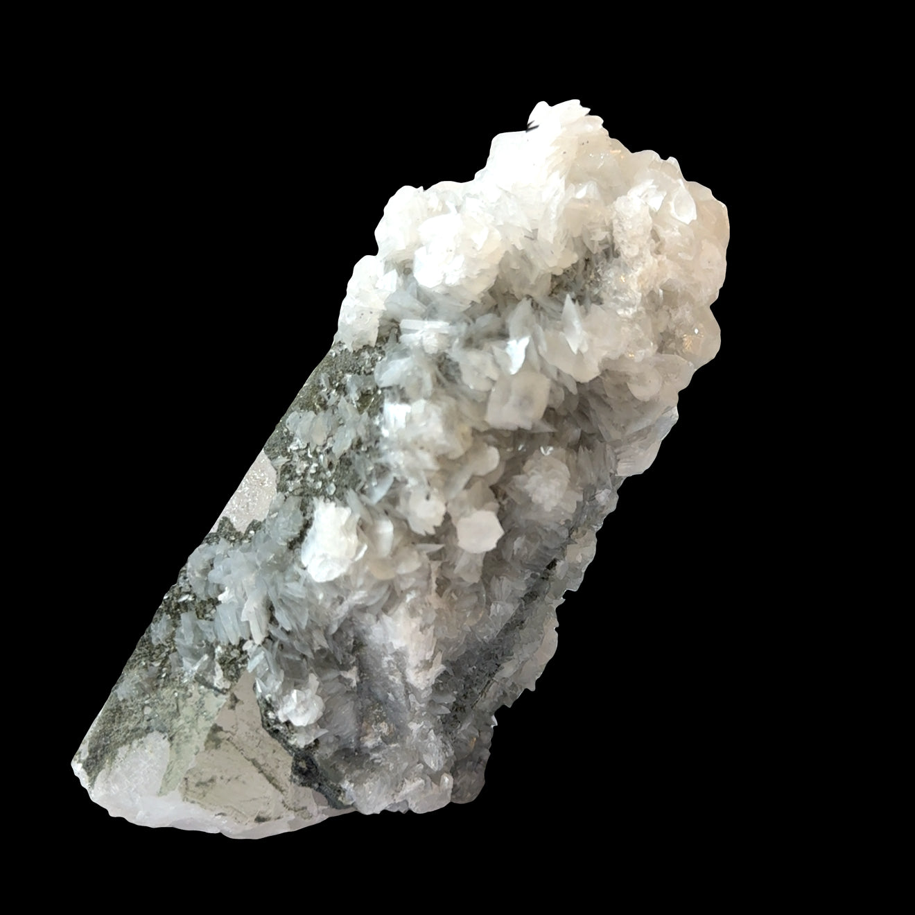 Clear Quartz Point with Calcite, Fluorite, and Pyrite Inclusions