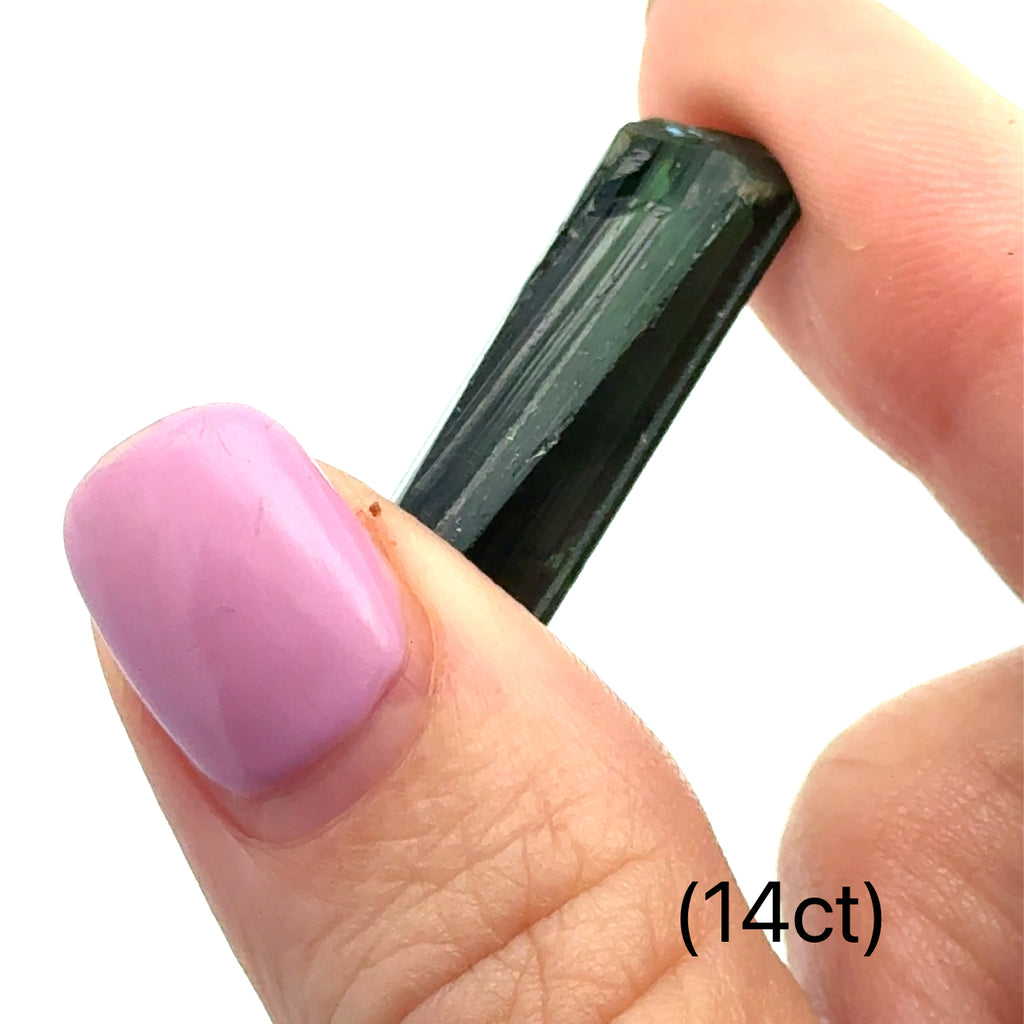 Unique Green Tourmaline gemstone for meditation and spiritual growth (14ct) on white and in finger tips front view