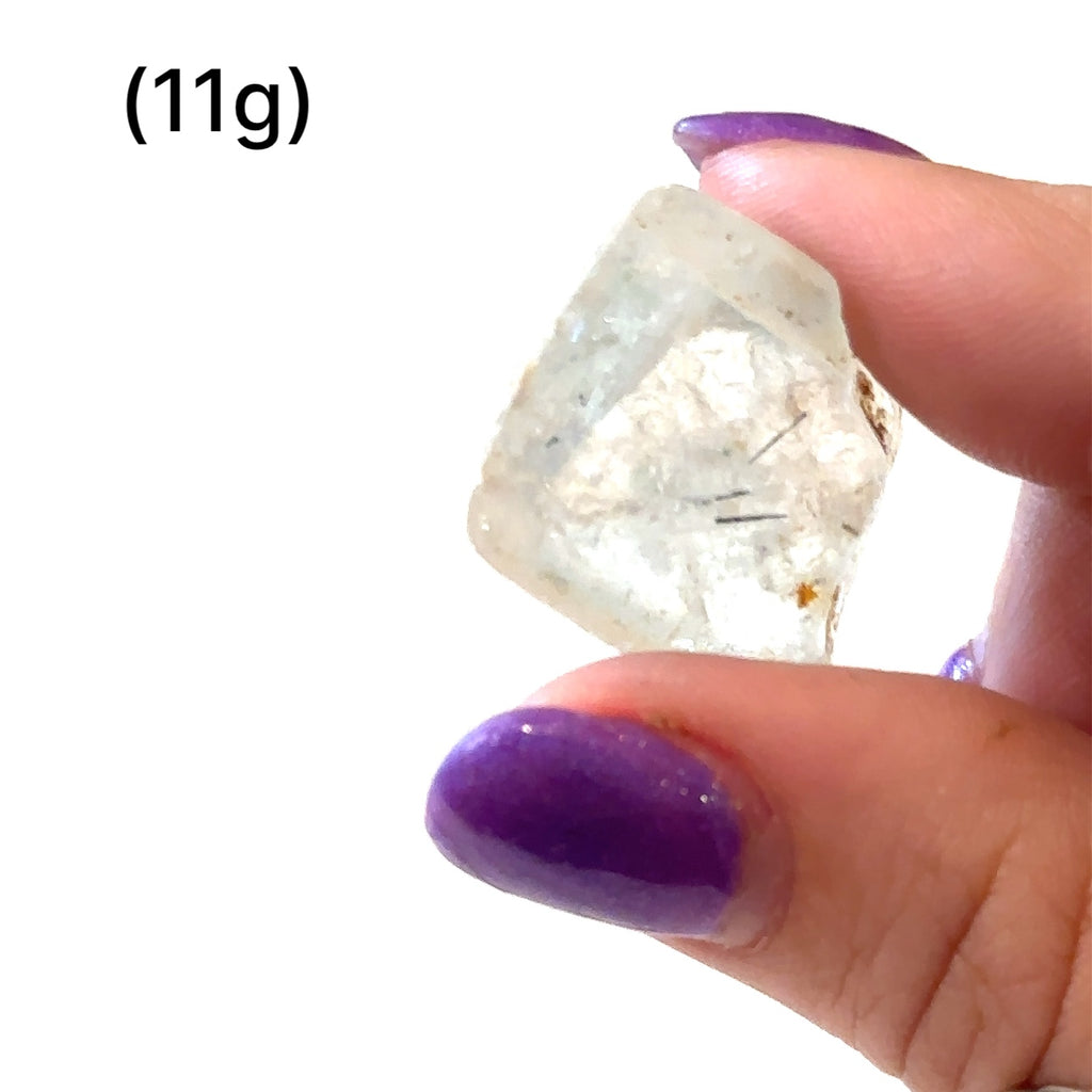 Unique White Topaz gemstone for emotional balance and manifestation of gemstones (11g)  in hand to show a close-up overview