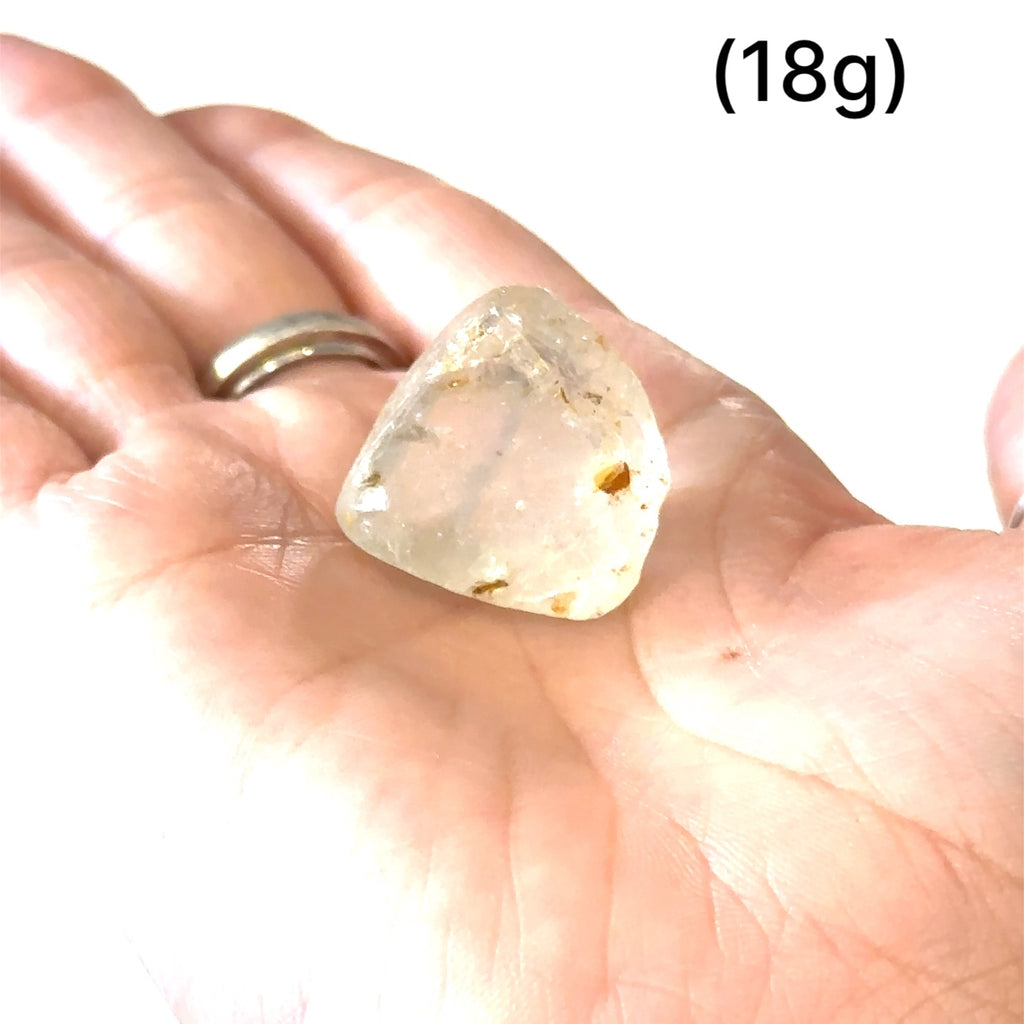 Unique White Topaz gemstone for emotional balance and manifestation of gemstones (18g)  in hand to show a close-up overview