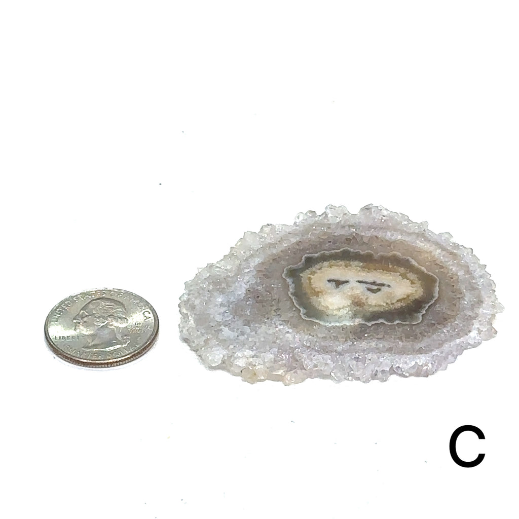 Unique agate stone slice for meditation and chakra balancing #C on white front and center view with quarter on the left side to show sizing