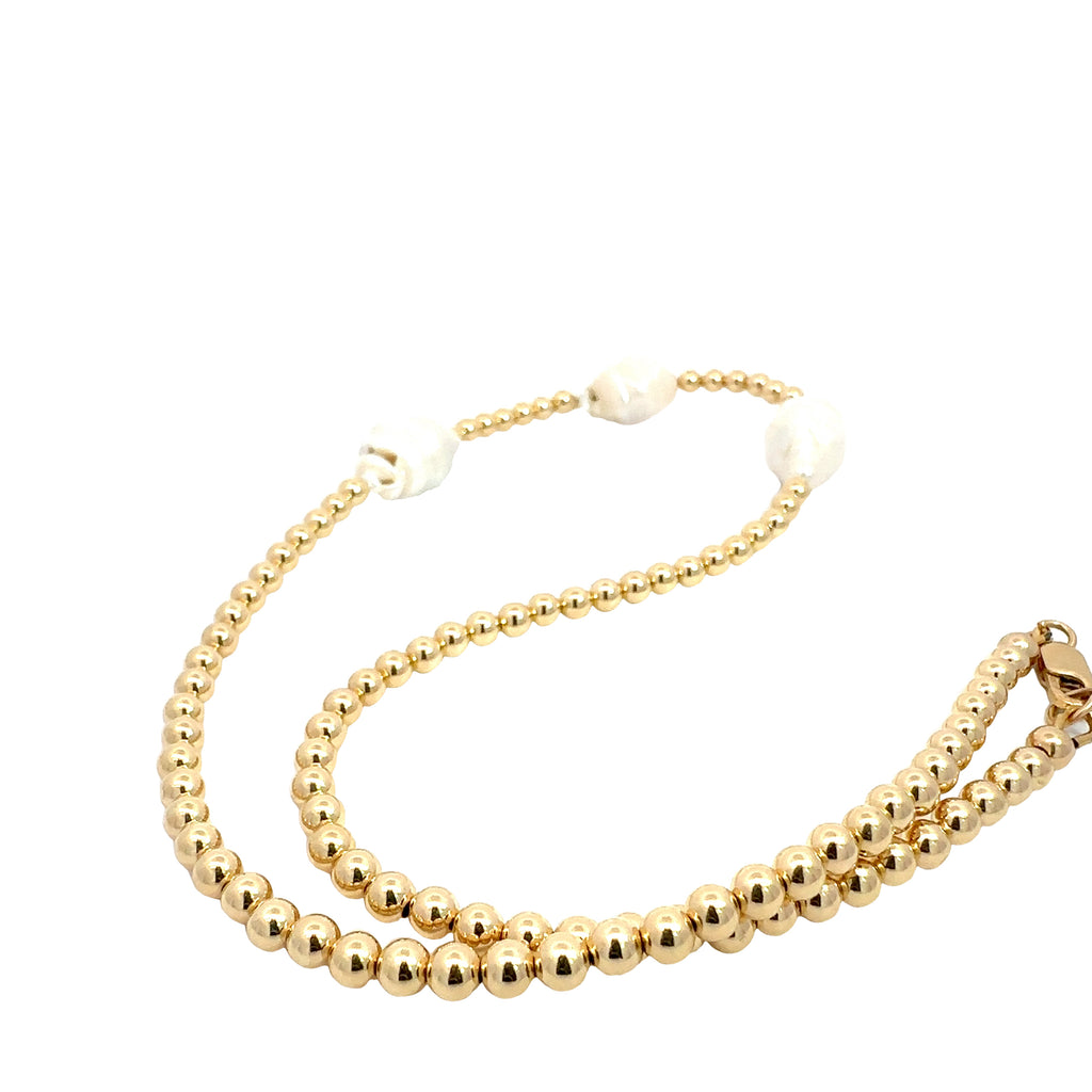 Water Baroque Pearl Necklace on white back close up overview