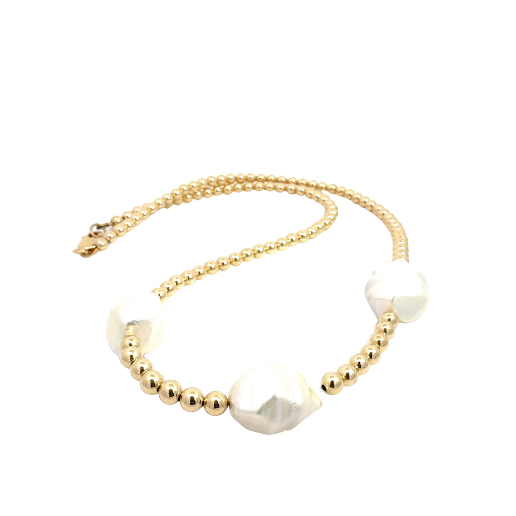 Water Baroque Pearl Necklace on white center close up overview