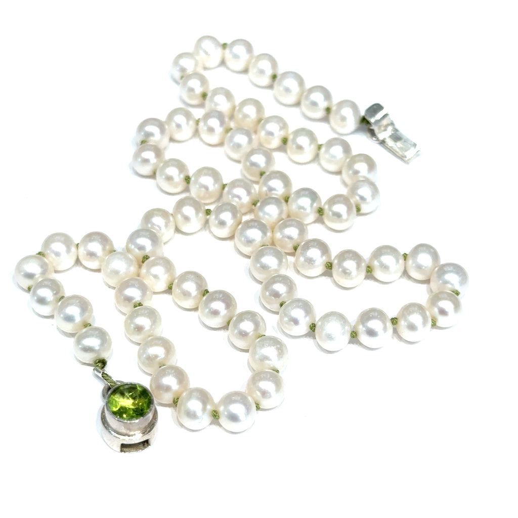 White Freshwater Pearl Necklace on white bottom up long close up view