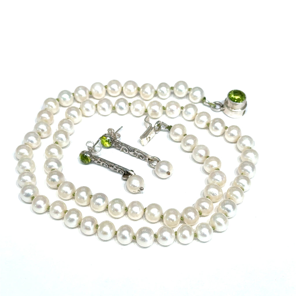 White Freshwater Pearl Necklace with matching earrings on white long close up view