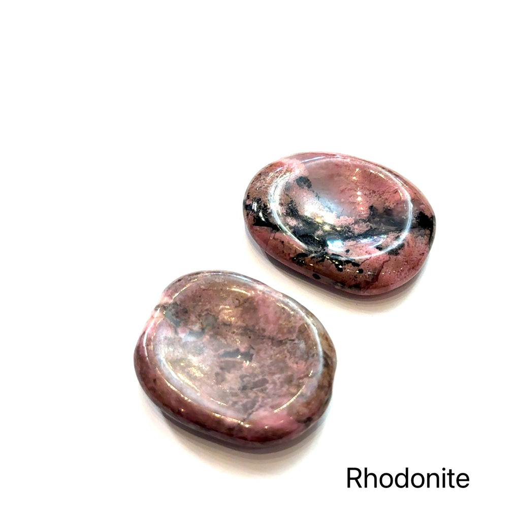 Worry Stone grouping of  rhodonite on white front view