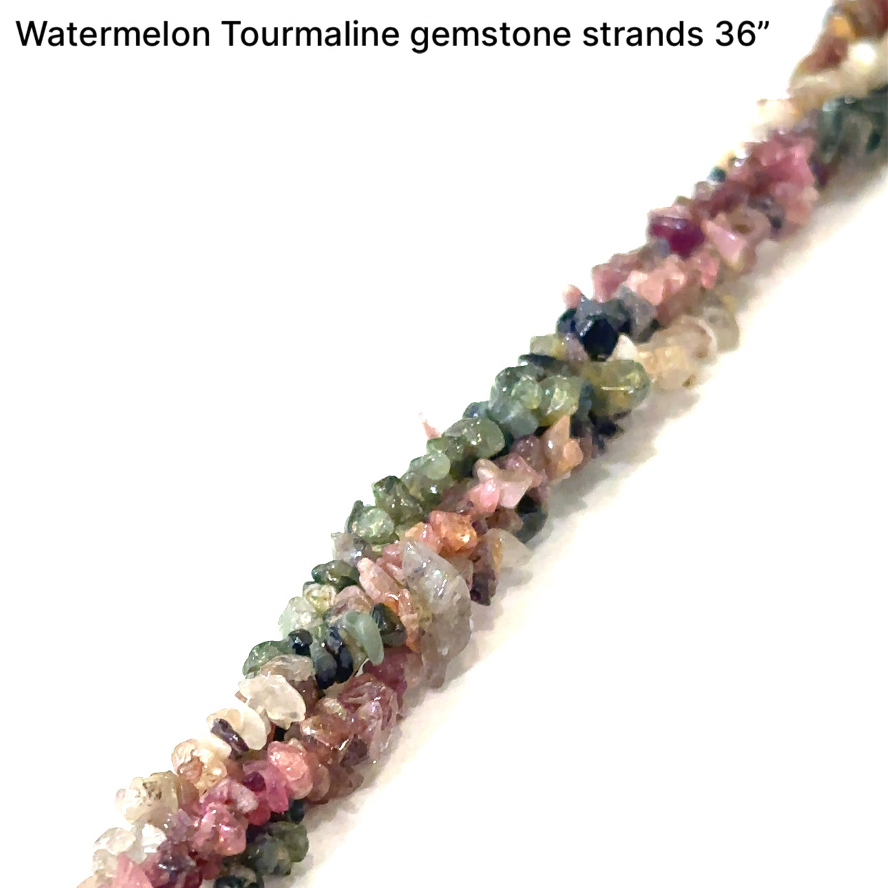 mixed Tourmaline chips gemstone strand, on a white background, front view. 