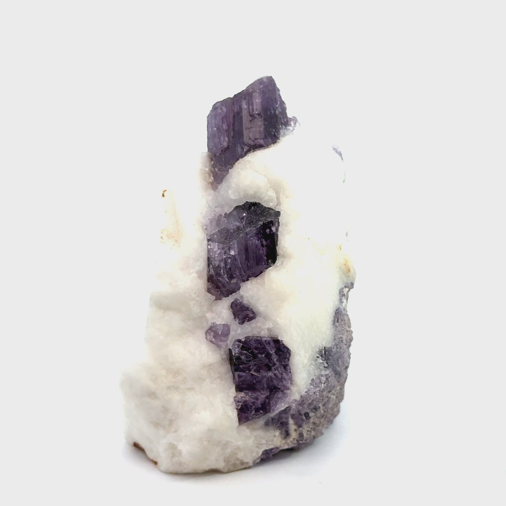 Purple Scapolite Gemstone 208 on white front view video