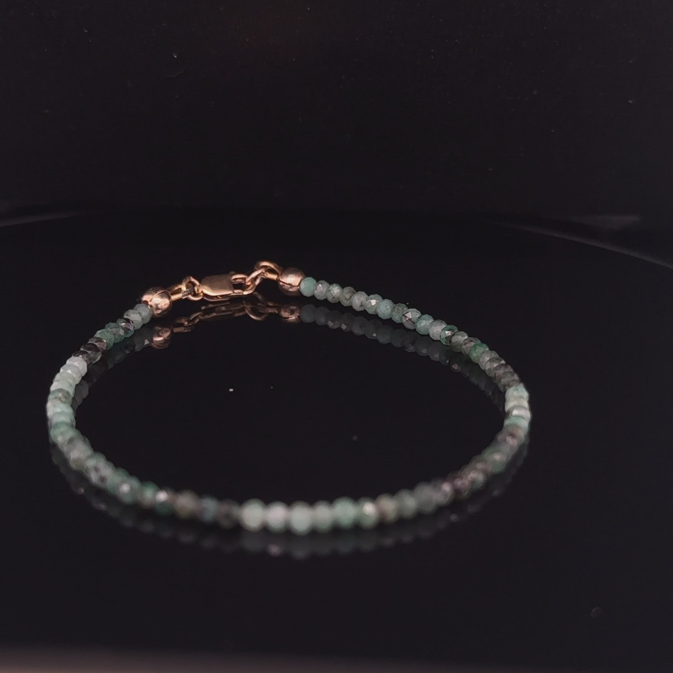 Handmade genuine Emerald gemstone bracelet with gold‑filled lobster clasp, available in 6.5'', 6.75'', and 7.25'' on black front overview video