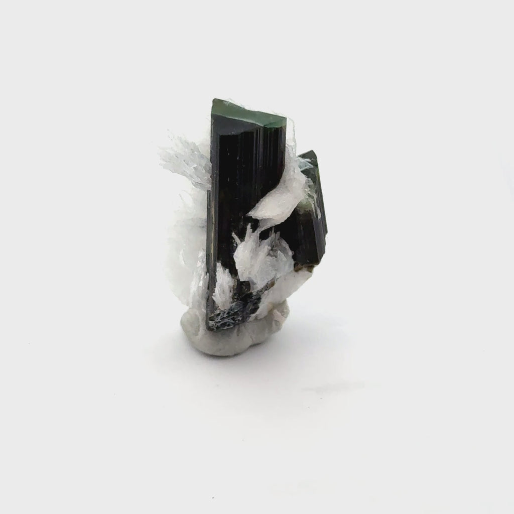 Raw Green Tourmaline with White Barite   19.4g / 97ct on white front view video