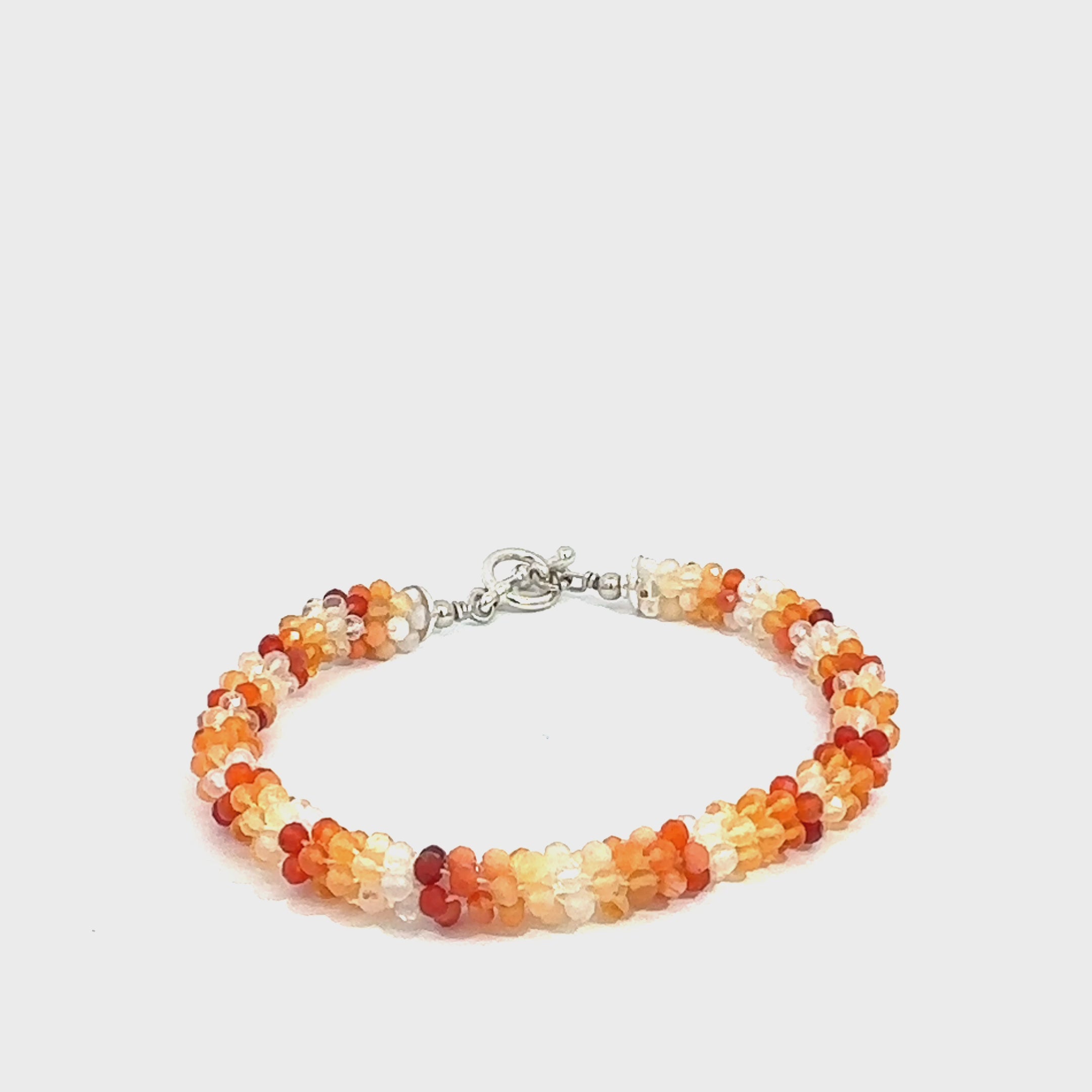 Fire Opal Crocheted Gemstone Bracelet on white center overview video
