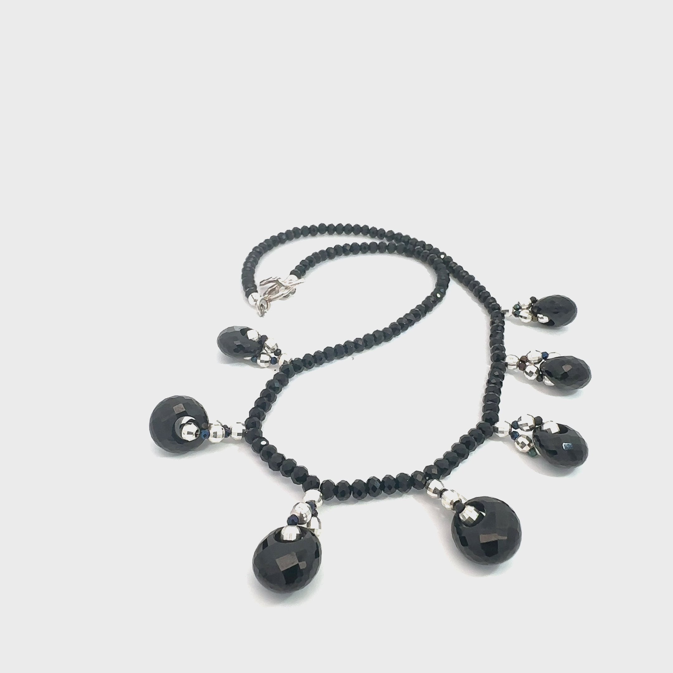 Handmade Black Tourmaline & Black Spinel beaded necklace with sterling silver beads, 16.5 inches on white overview video