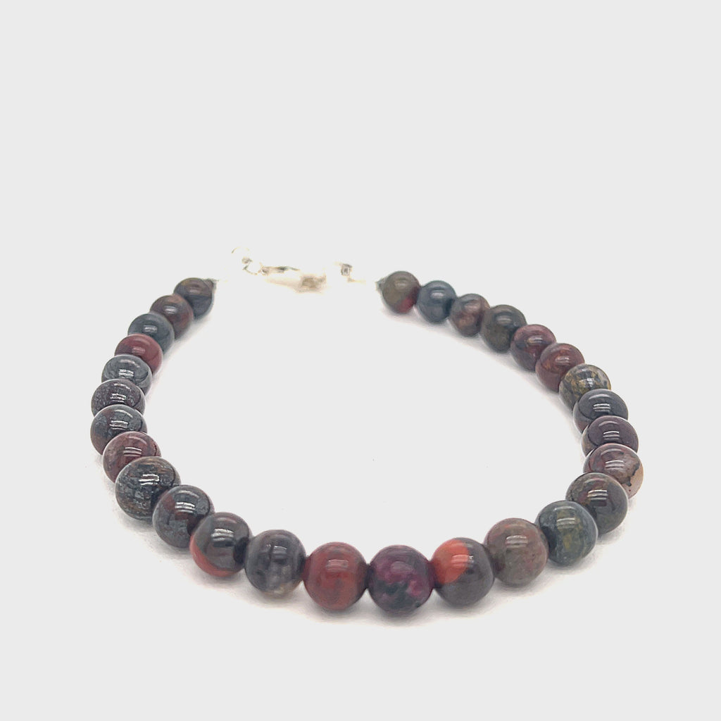 Brecciated Jasper gemstone bracelet with 6mm beads and sterling silver lobster clasp, 7.25 inches long on white front angle overview video