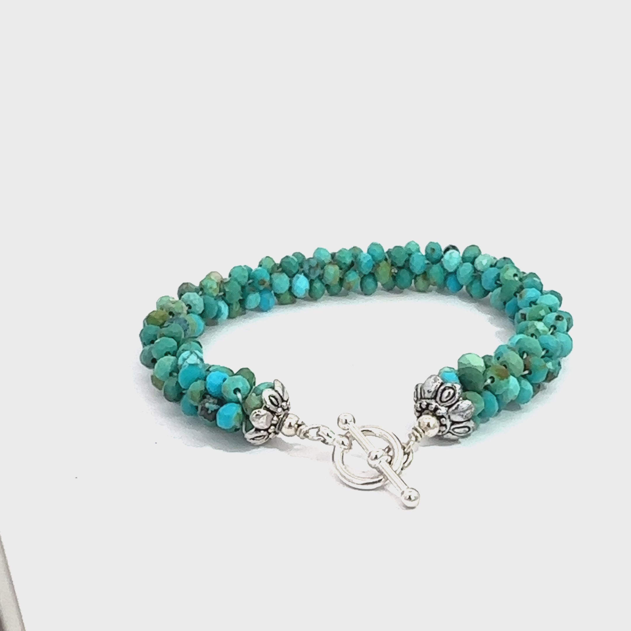 Turquoise Crocheted Gemstone Bracelet on white back overview video