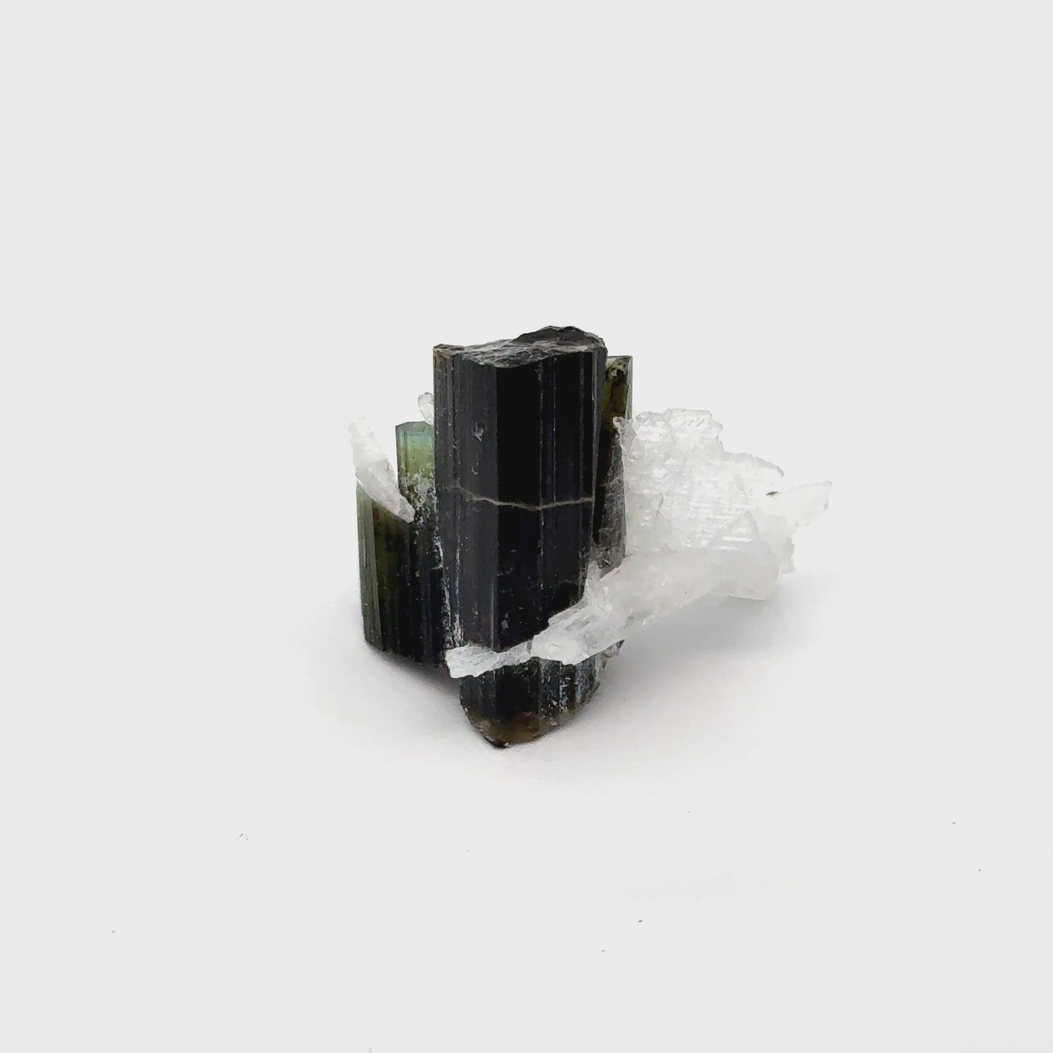 Raw Green Tourmaline with White Barite   5.4g / 27ct on white front view video