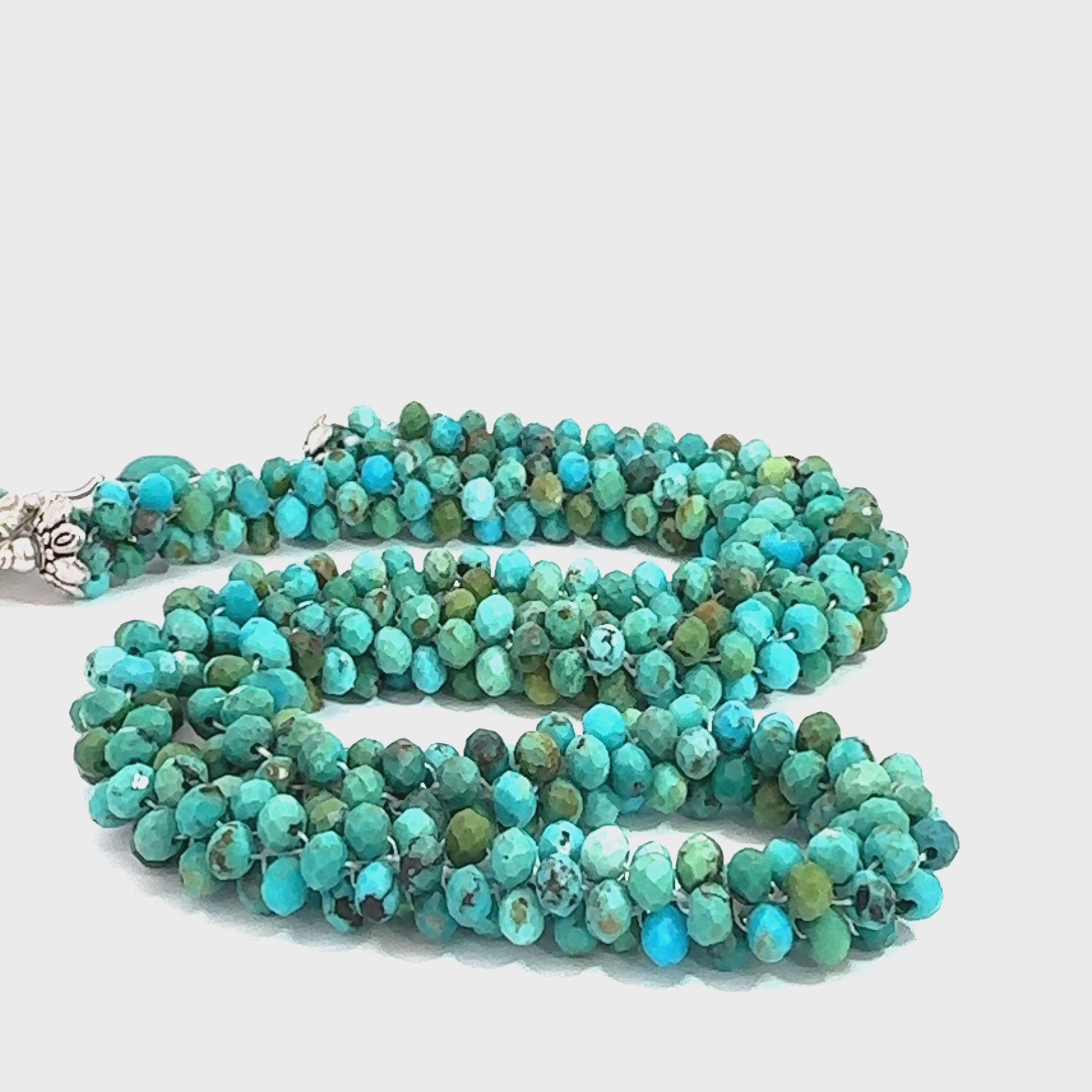 Turquoise Crocheted Gemstone Necklace on white front long overview video