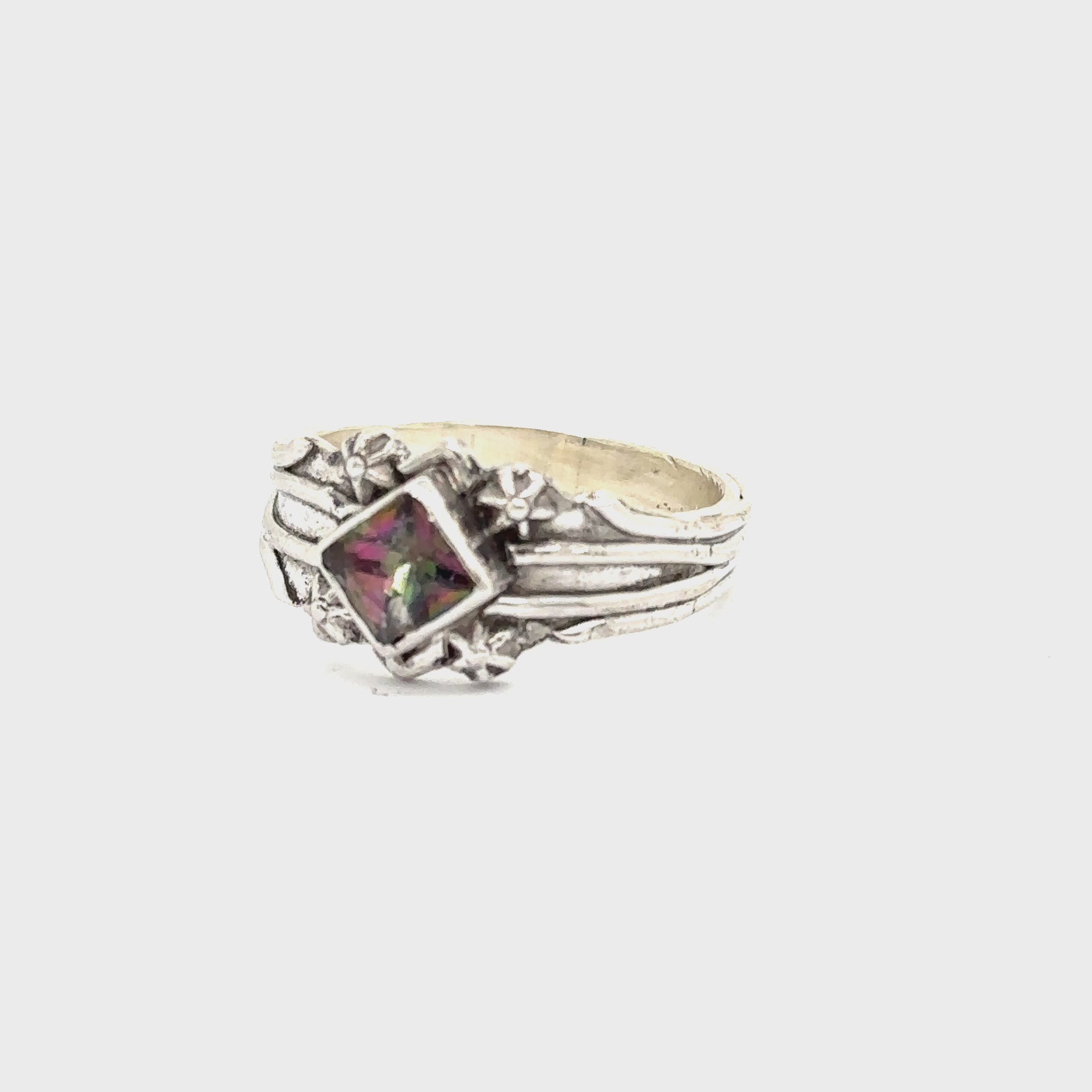 Hand-forged sterling silver Mystic Topaz ring with square faceted gemstone, size 8.25 on white front view video