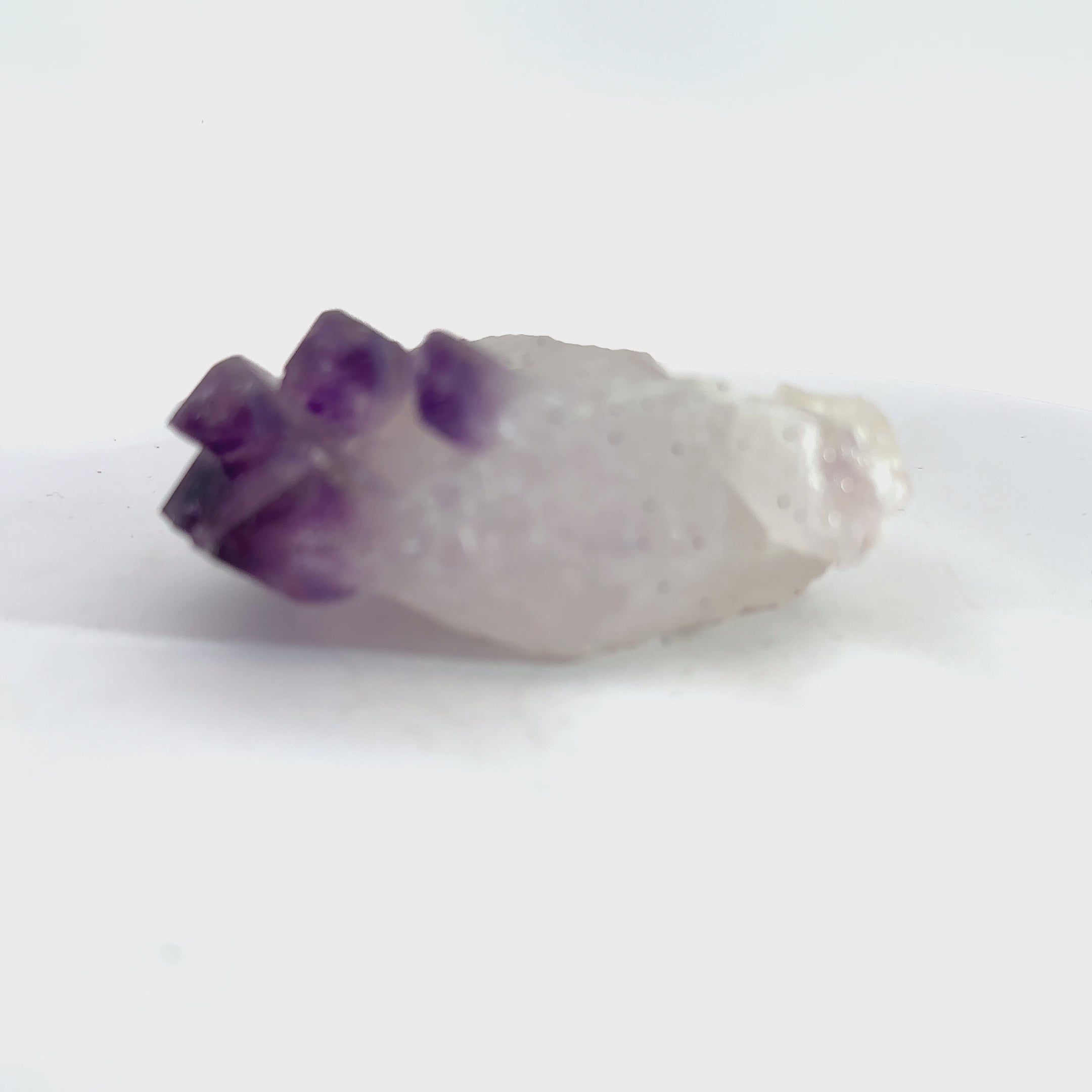 Amethyst Raw Gemstone Collector’s Piece #1 on white front overview video