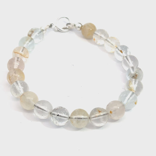 Handmade Blue Topaz gemstone bracelet with sterling silver toggle clasp, November birthstone jewelry on white front view video