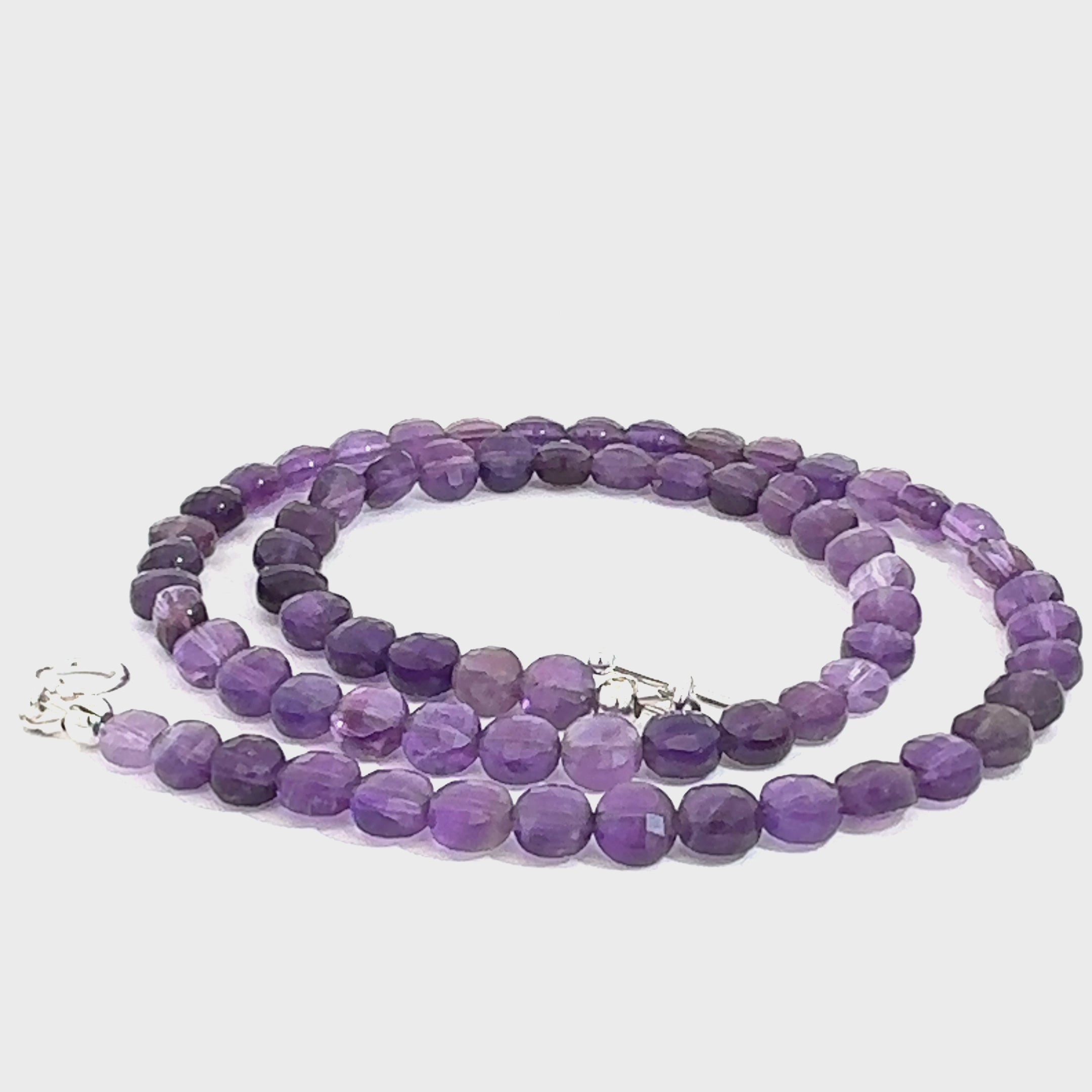 Amethyst Gemstone Necklace on white center spiral overview video