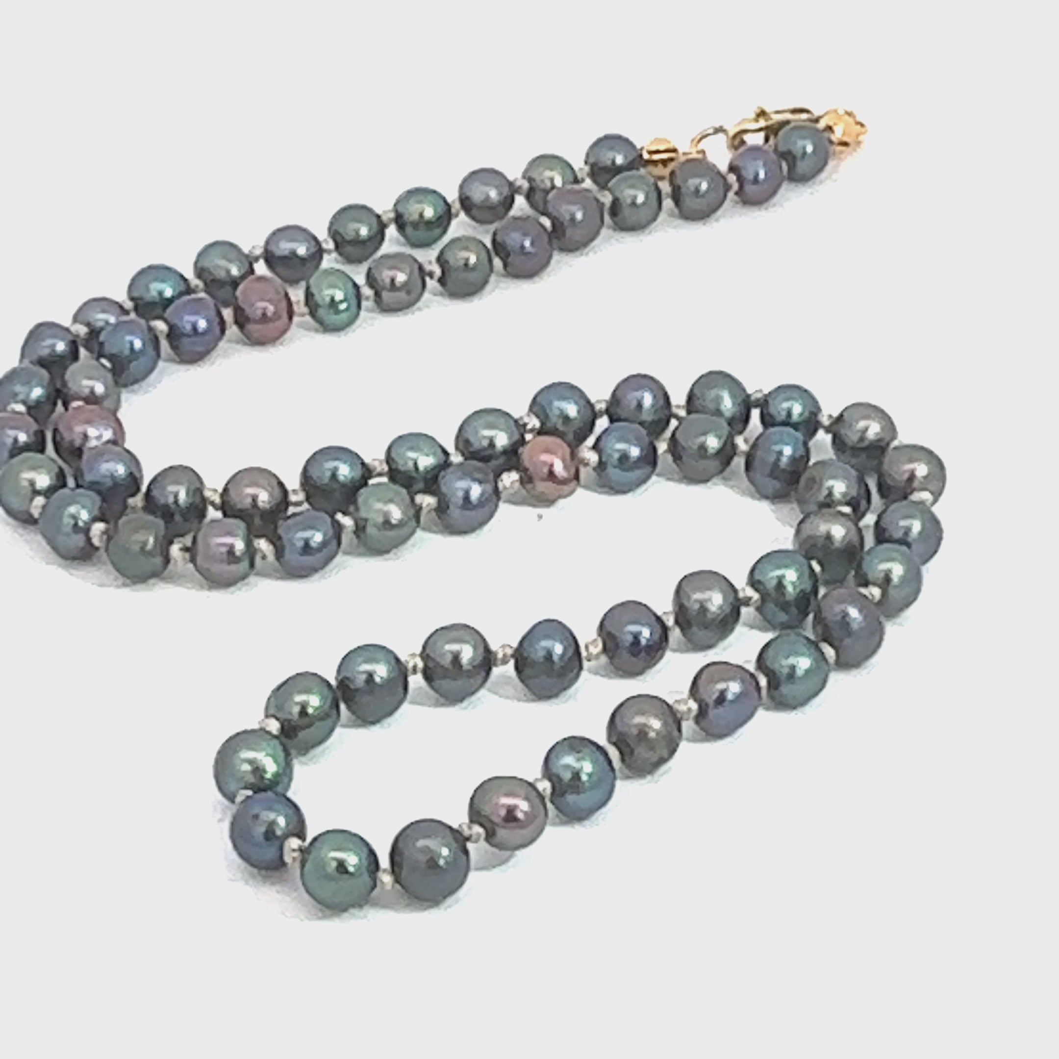 Peacock Purple Freshwater Pearl Necklace on white center close up view video