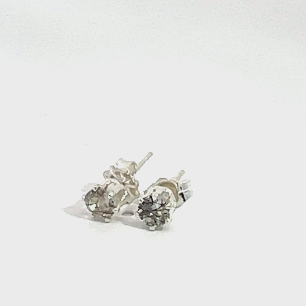 4mm faceted Rutilated Quartz stud earrings in a sterling silver basket setting on a white background front overview. video