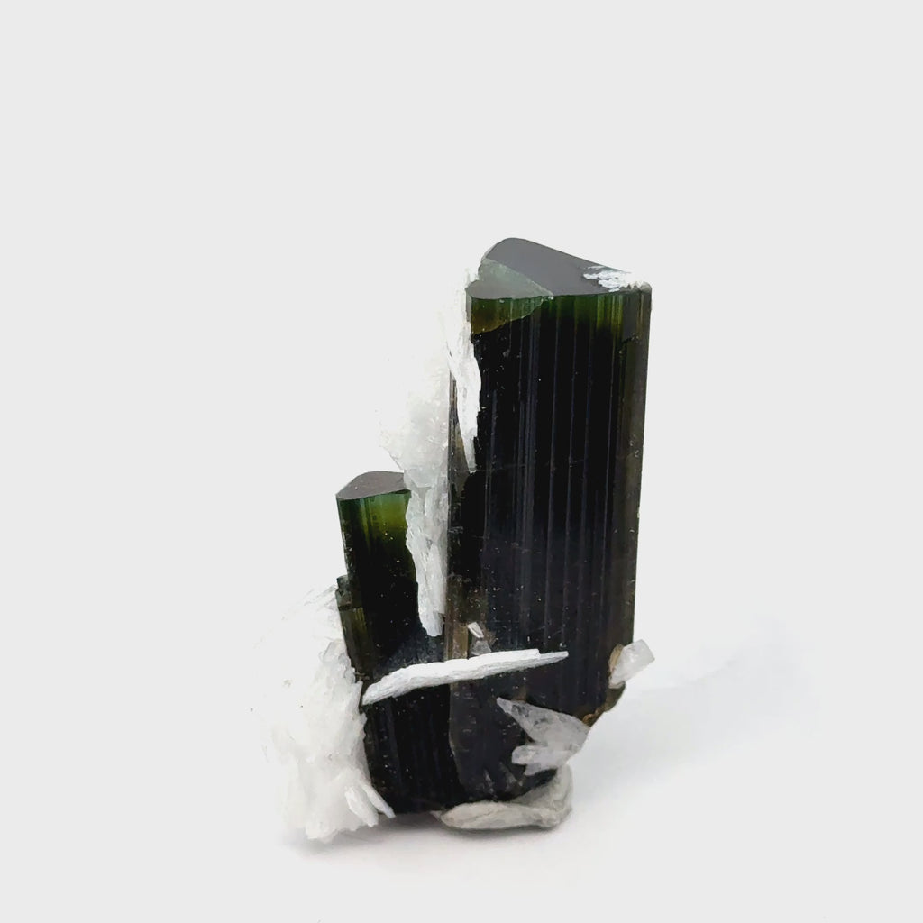 Raw Green Tourmaline with White Barite   24.5g / 122ct on white front view video