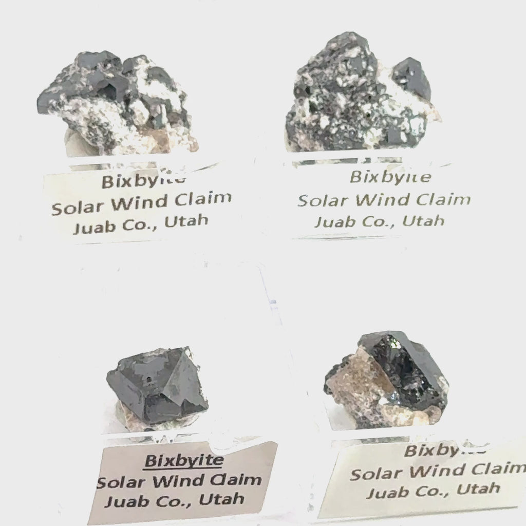 Bixbyite Gemstone grouping on white front view video